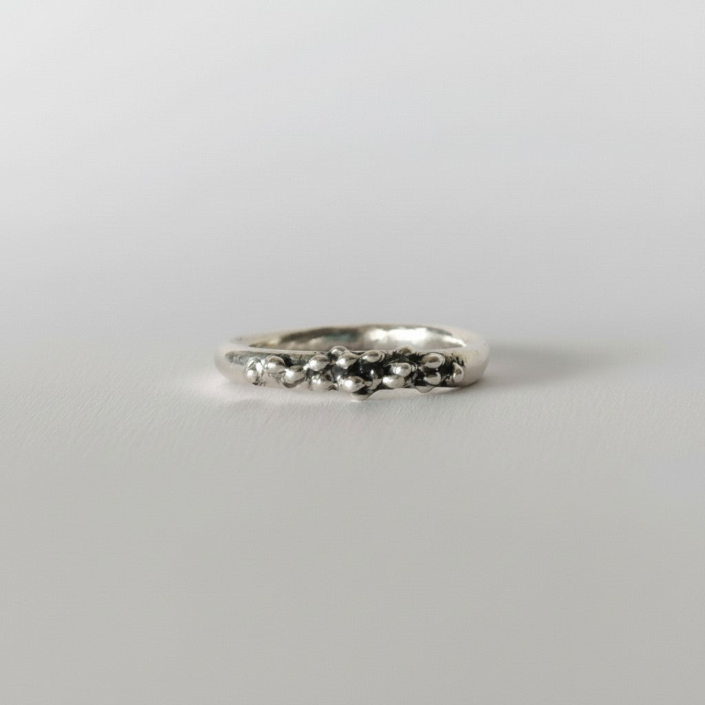 SosyGallery irregular sterling silver 925 stacking ring with a sculptural, textured organic bead design.