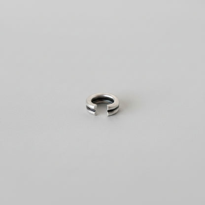 Silver ring on a watercolor background
