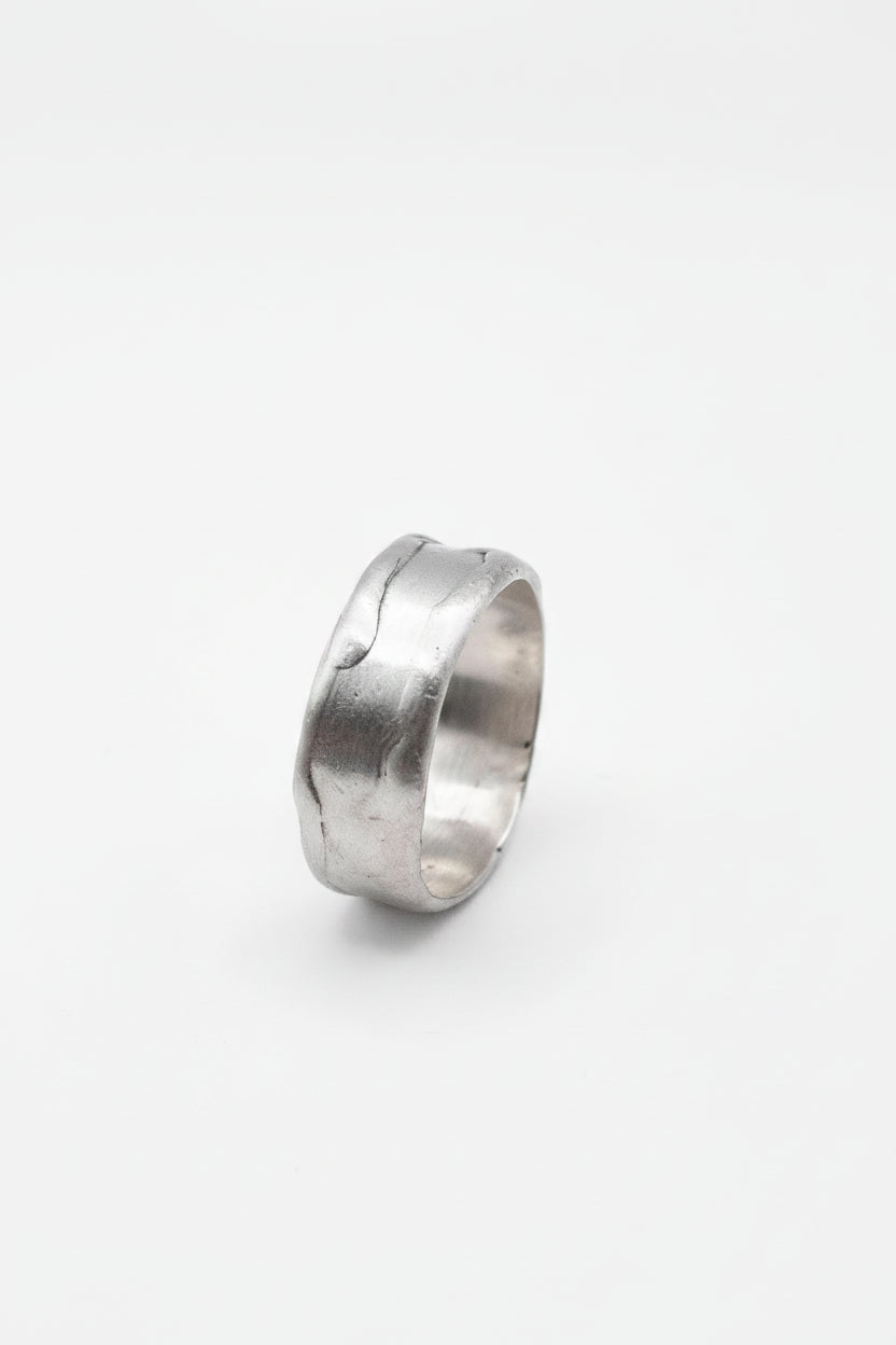 Silver ring on a white background