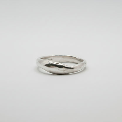 Silver ring on a white background