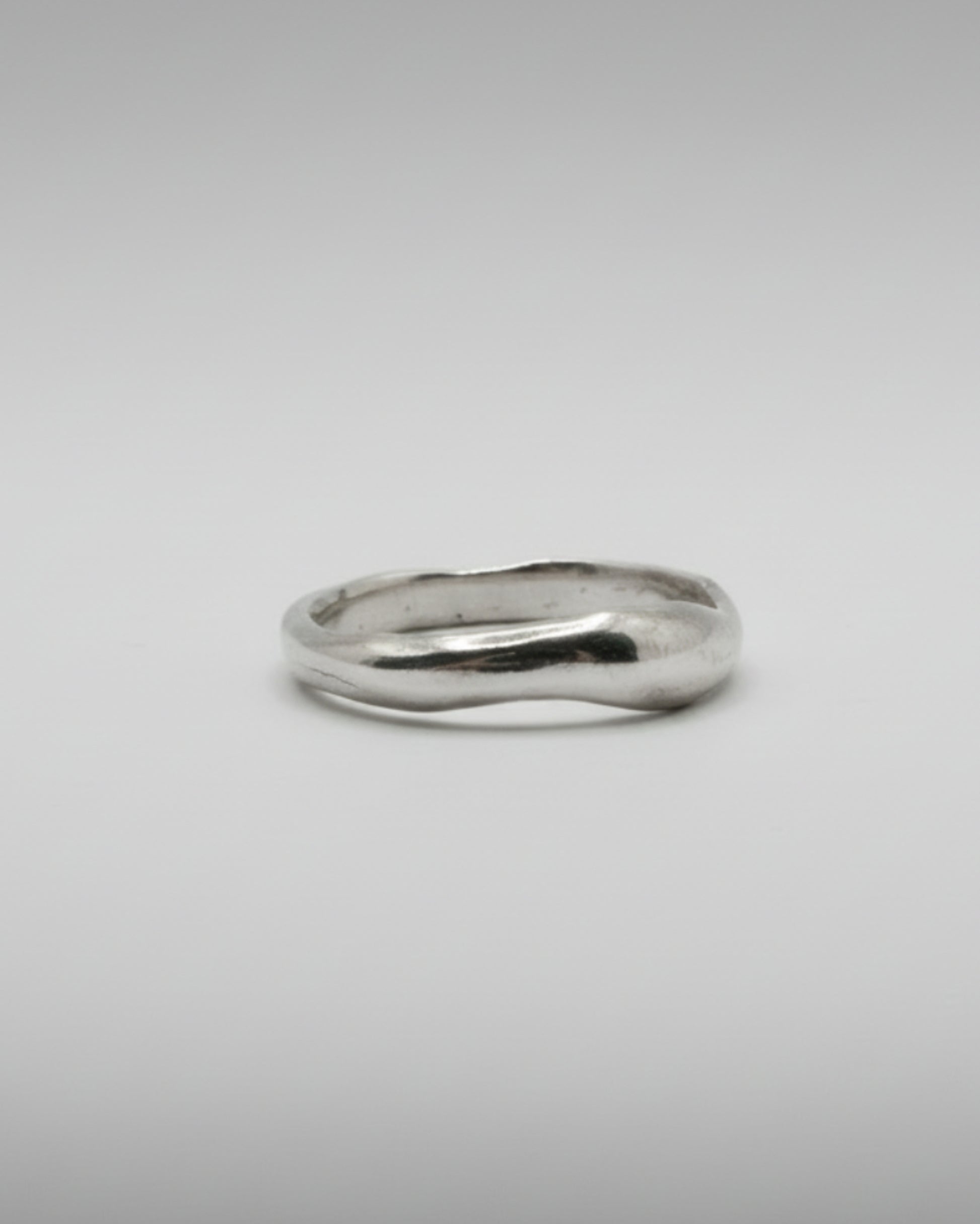 Silver ring on a white background