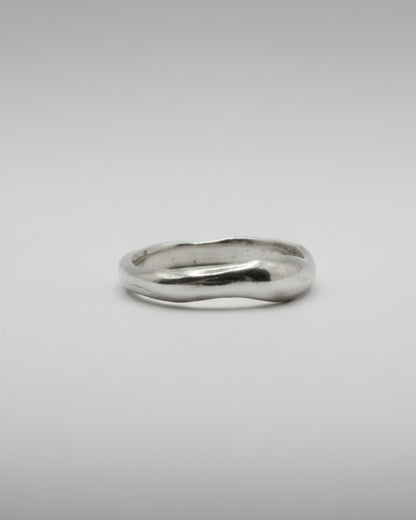 Silver ring on a white background