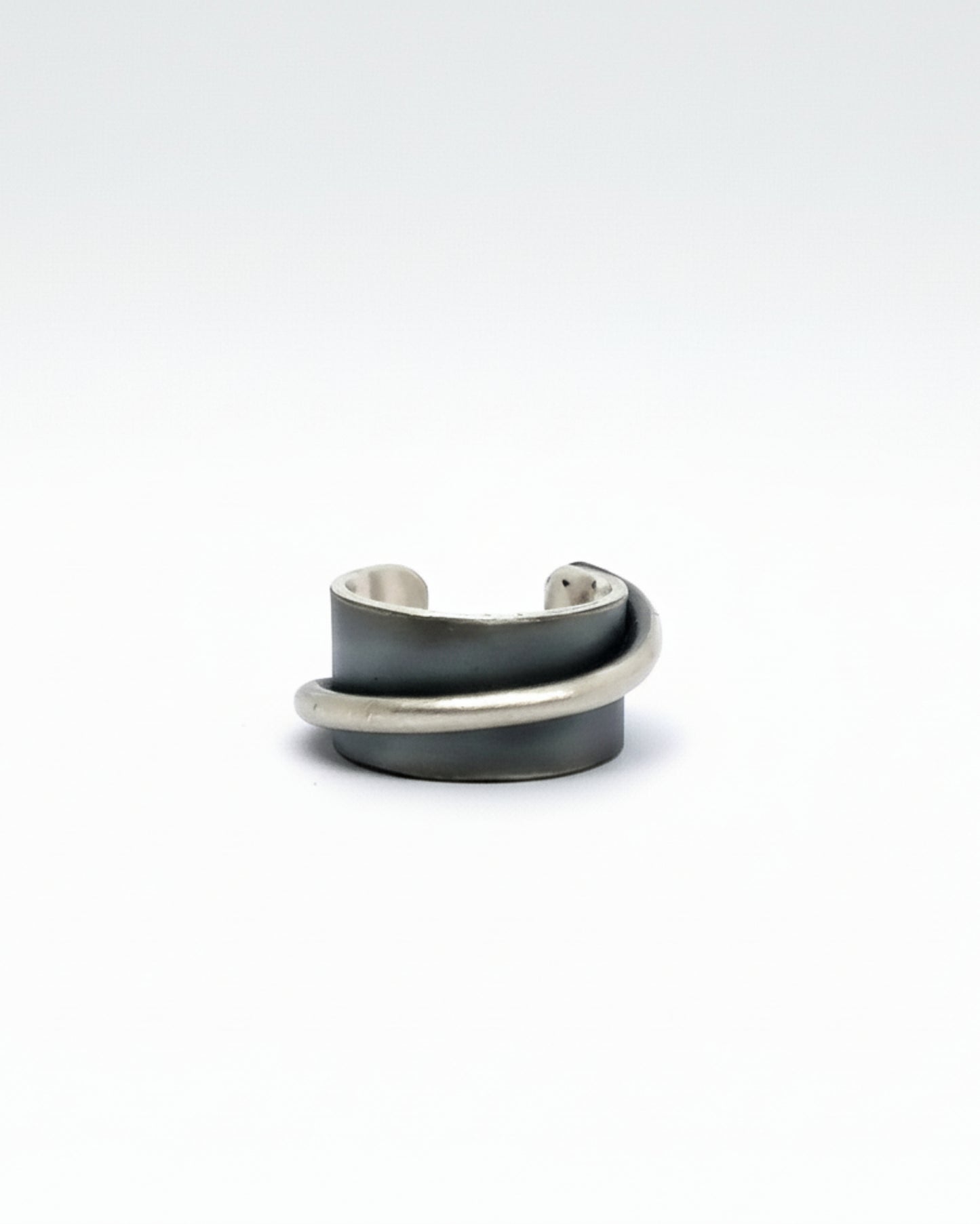 Two silver rings stacked on a white background