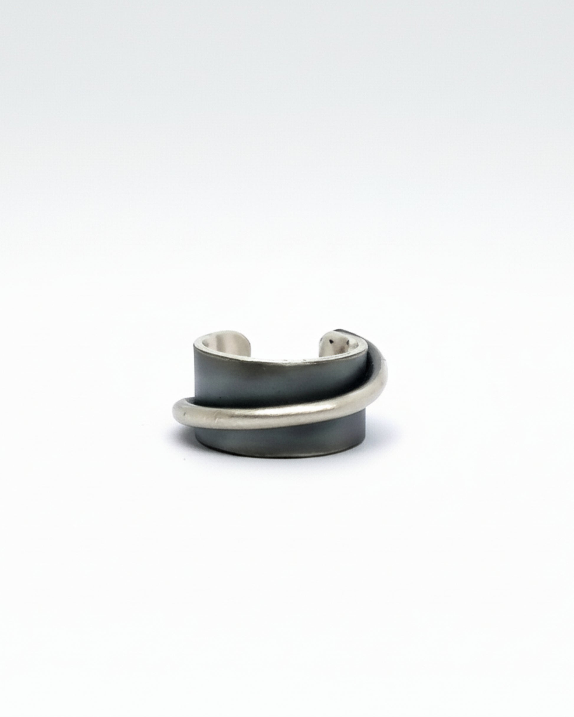 Two silver rings stacked on a white background