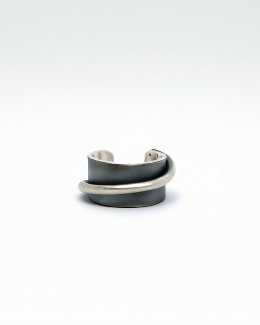 Two silver rings stacked on a white background