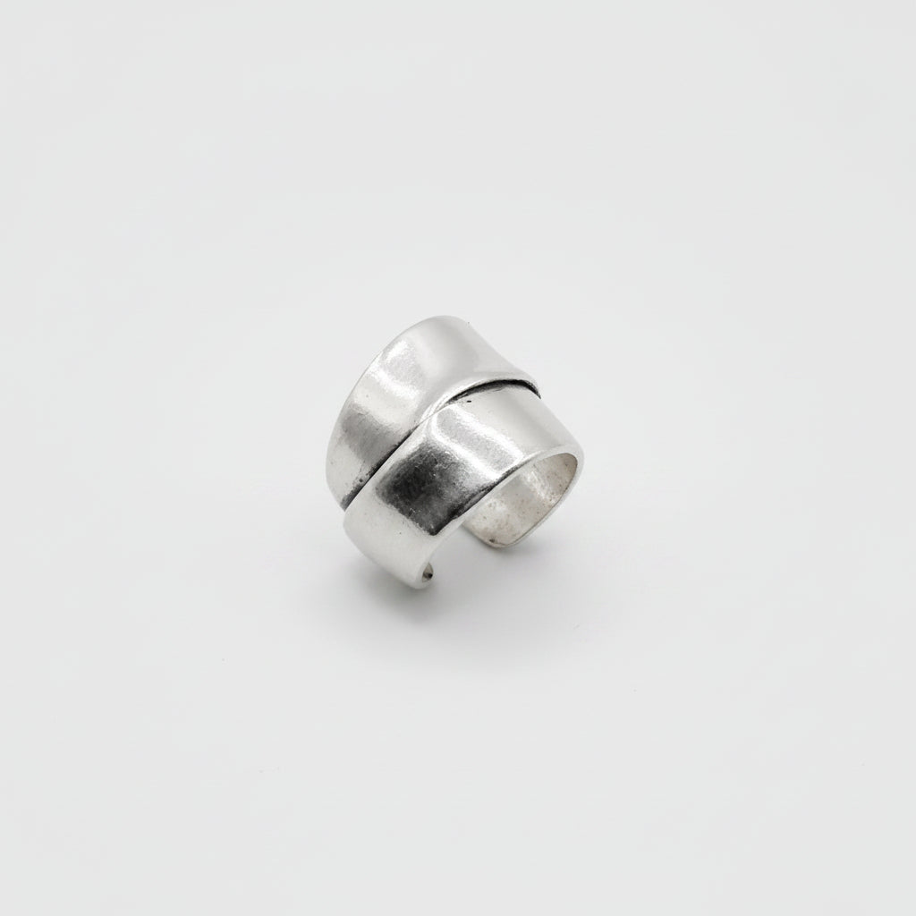 Silver ring on a white background