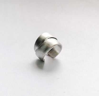 Silver ring on a white background