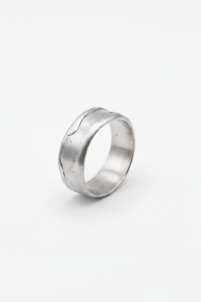 Silver ring on a white background
