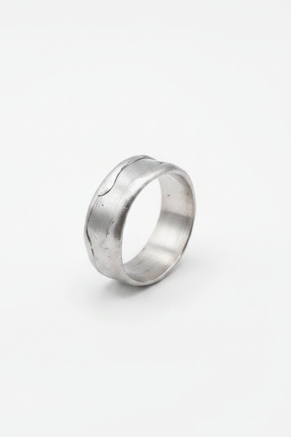 Silver ring on a white background