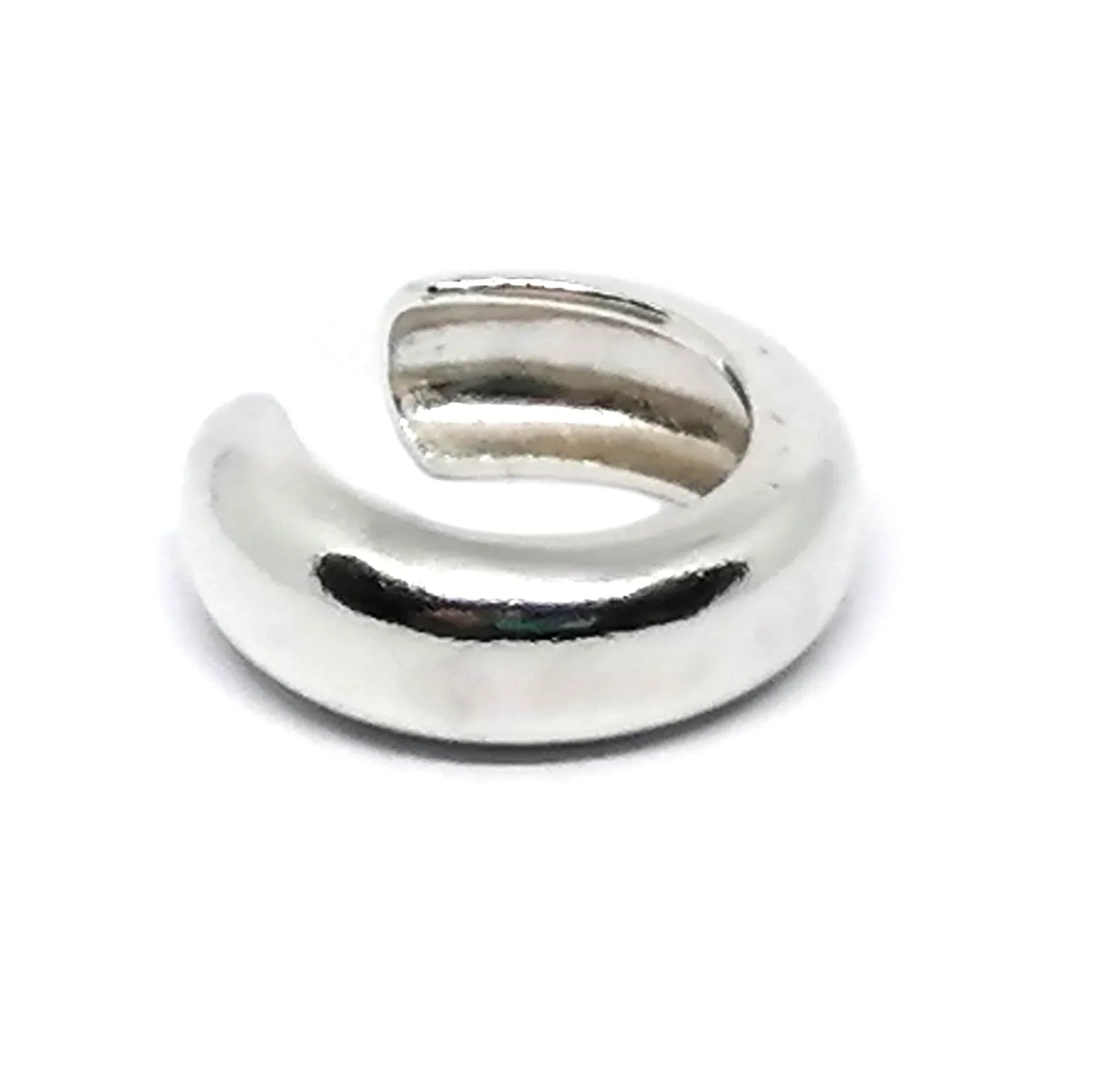 Chunky silver ear cuff minimalist jewelry on white background