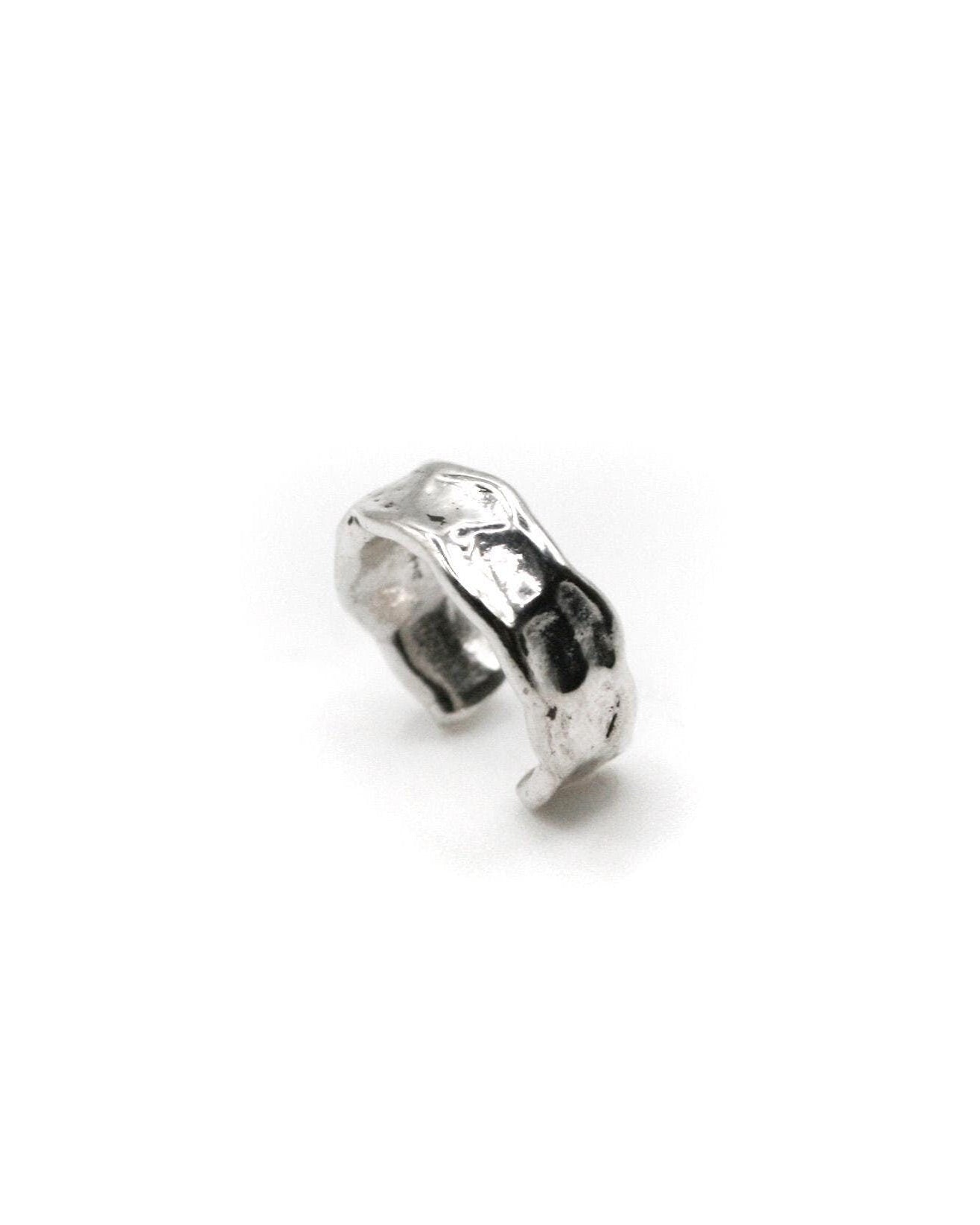 Silver ring on a white background