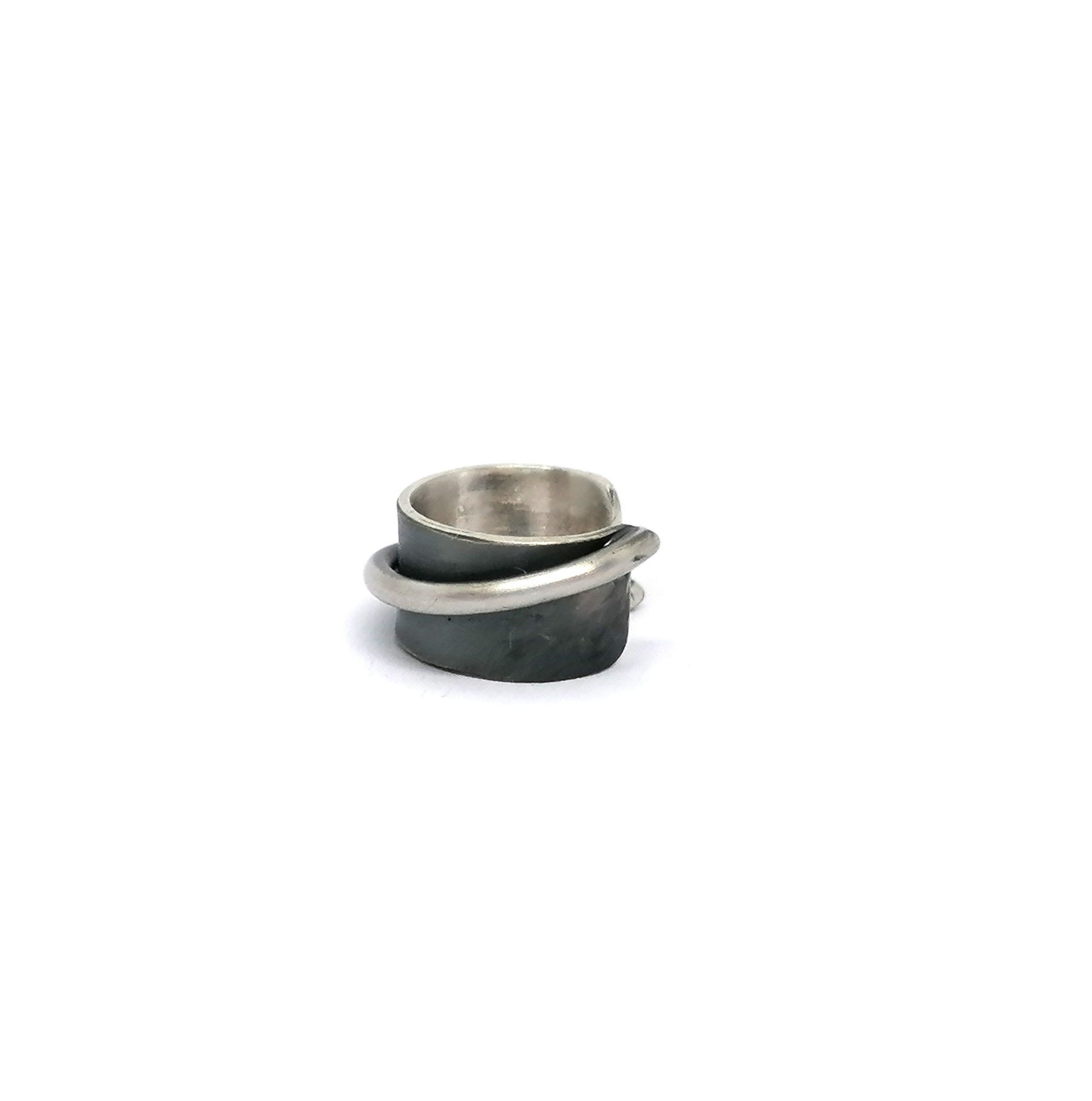 Two silver rings stacked on a white background