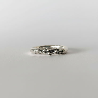 SosyGallery irregular sterling silver 925 stacking ring with a sculptural, textured organic bead design.