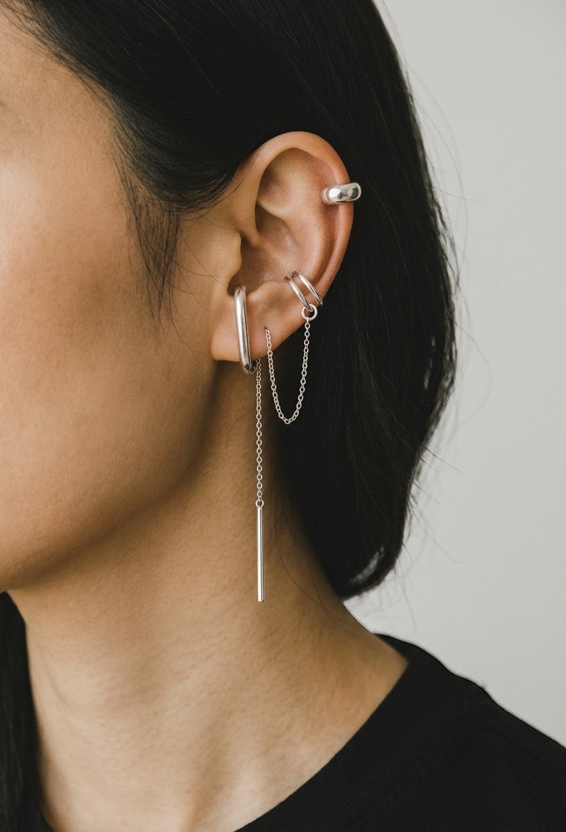 SosyGallery 925 sterling silver conch ear cuff with delicate chain detail, modern non-piercing jewelry design.