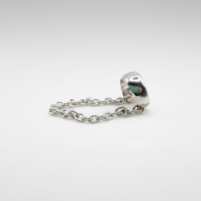 SosyGallery sterling silver conch ear cuff with delicate chain detail, a non-pierced modern jewelry piece.