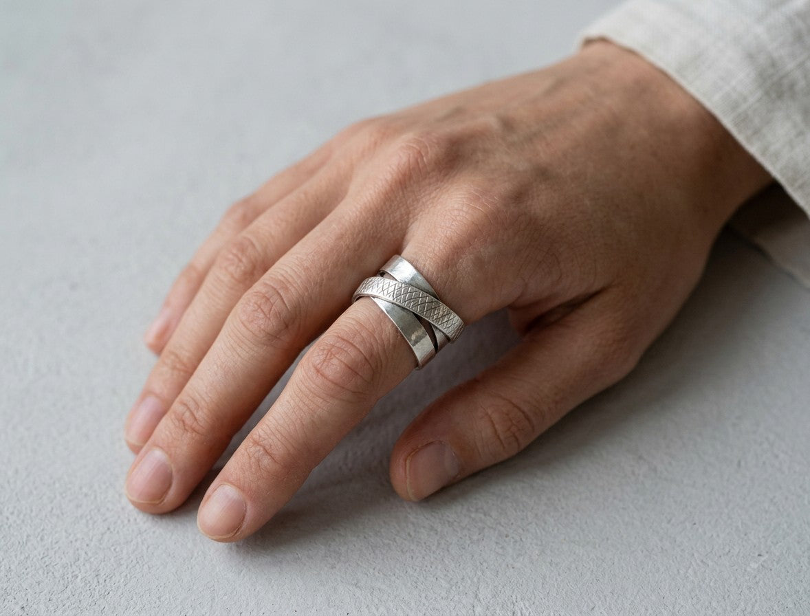 SosyGallery wide 925 sterling silver multi-band ring with textured crosshatch detail and brushed finish on a hand.