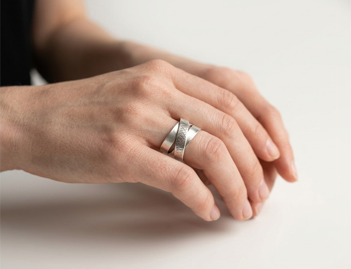 SosyGallery wide 925 sterling silver multi-band ring with a brushed finish and textured crosshatch detail on a hand.