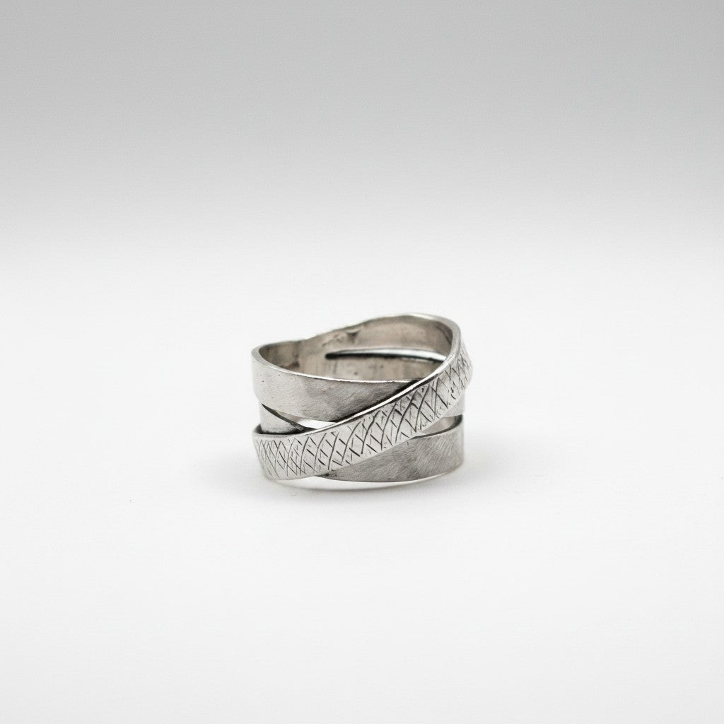 SosyGallery wide 925 sterling silver statement ring featuring a layered multi-band design with textured crosshatch.