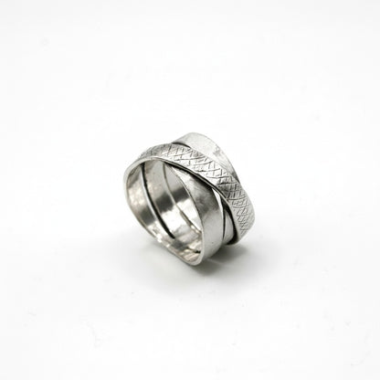 SosyGallery wide 925 sterling silver statement ring with a layered multi-band design and textured crosshatch finish.