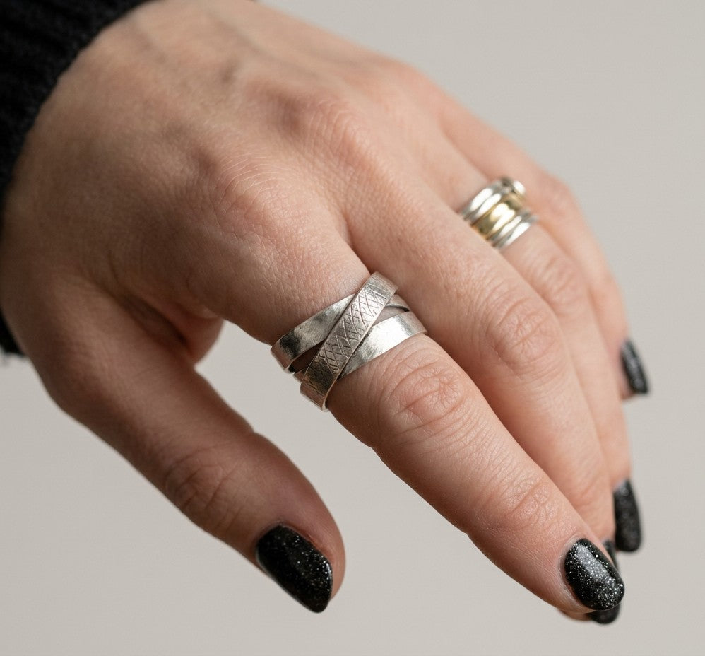 SosyGallery wide 925 sterling silver multi-band ring with textured crosshatch detail and a brushed finish on a hand.